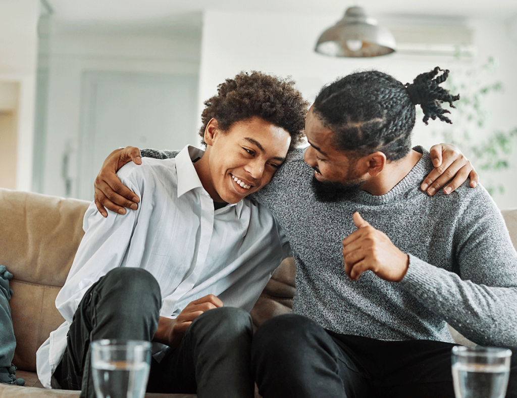 a father and son hug after leaning about building a relationship with your child