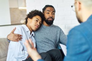 a father and son learn about family systems theory in therapy