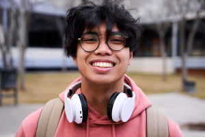 a boy smiles after learning coping strategies for teens with ocd