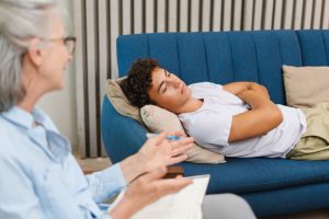 a teen talks to a provider during psychiatric care