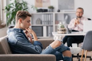 a teen talks to a psychiatrist