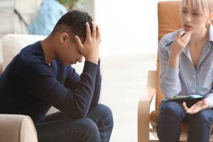 a teen listens after asking a therapist does ptsd affect memory?