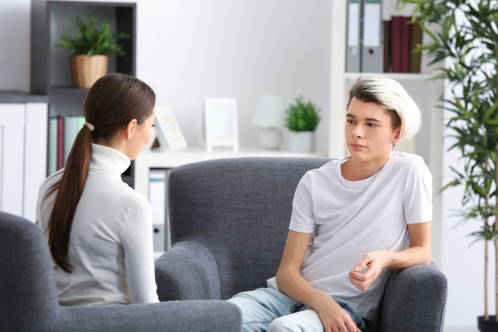 Teen talking to counselor
